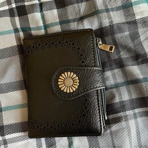 Black Wallet with Gold Flower Accent